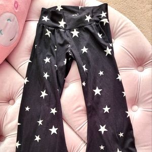 Girls custom star print bell bottom pants.